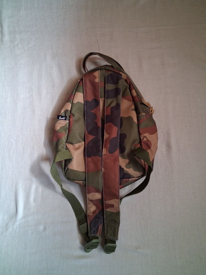 Herschel Nova mini backpack (Category: Backpacks) located in Quezon City. Submitted by threeleggeddog (Listing ID 1468829254, Image 2). Description: pre-loved 9/10 condition camo color.