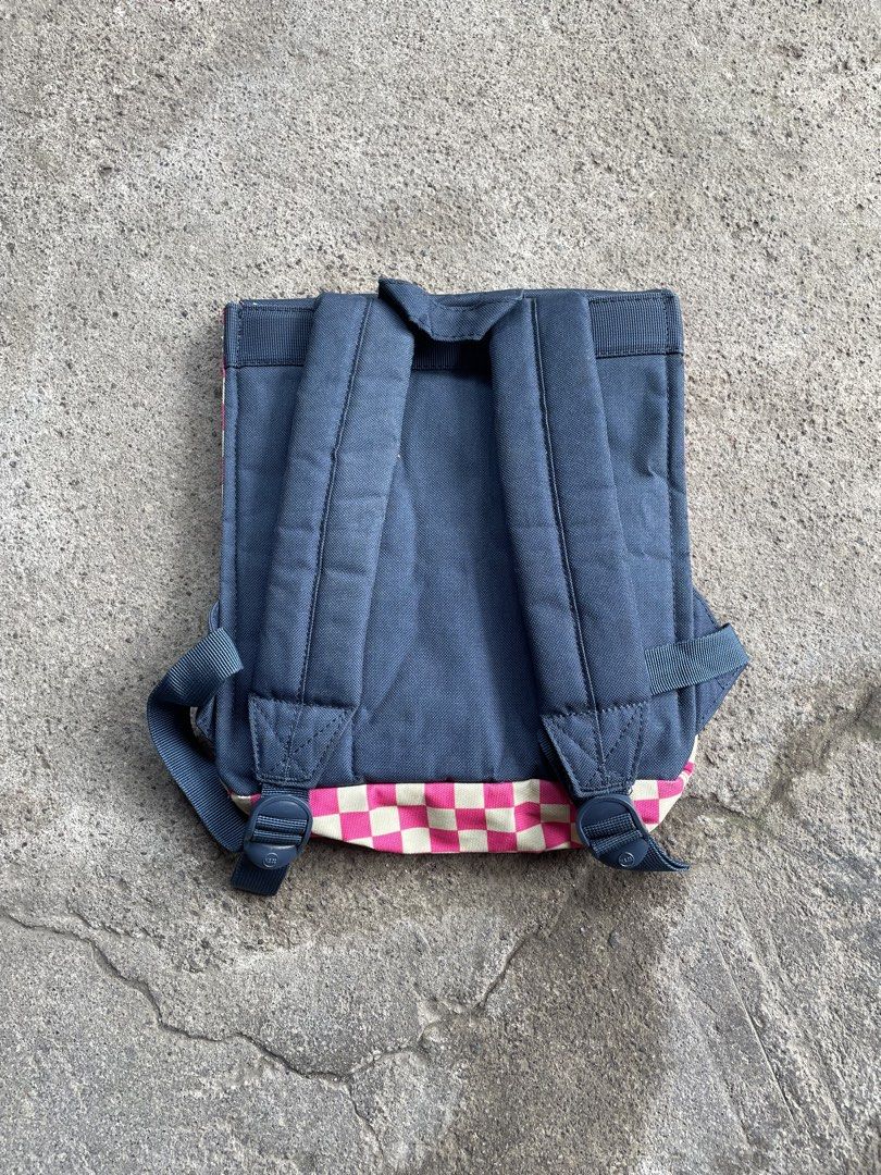 Herschel Supply Co. Pink Checkered Backpack (Category: Backpacks) located in General Santos City (Dadiangas). Submitted by christbluee (Listing ID 1468827607, Image 2). Description: - Brand: Herschel Supply Co. - Design: Pink & cream checkered pattern with dark navy top flap and bright pink buckle straps - Interior: Signature red and white striped fabric lining - Details: Classic diamond lash tab, branded H.S.Co. hardware, and front brand patch -