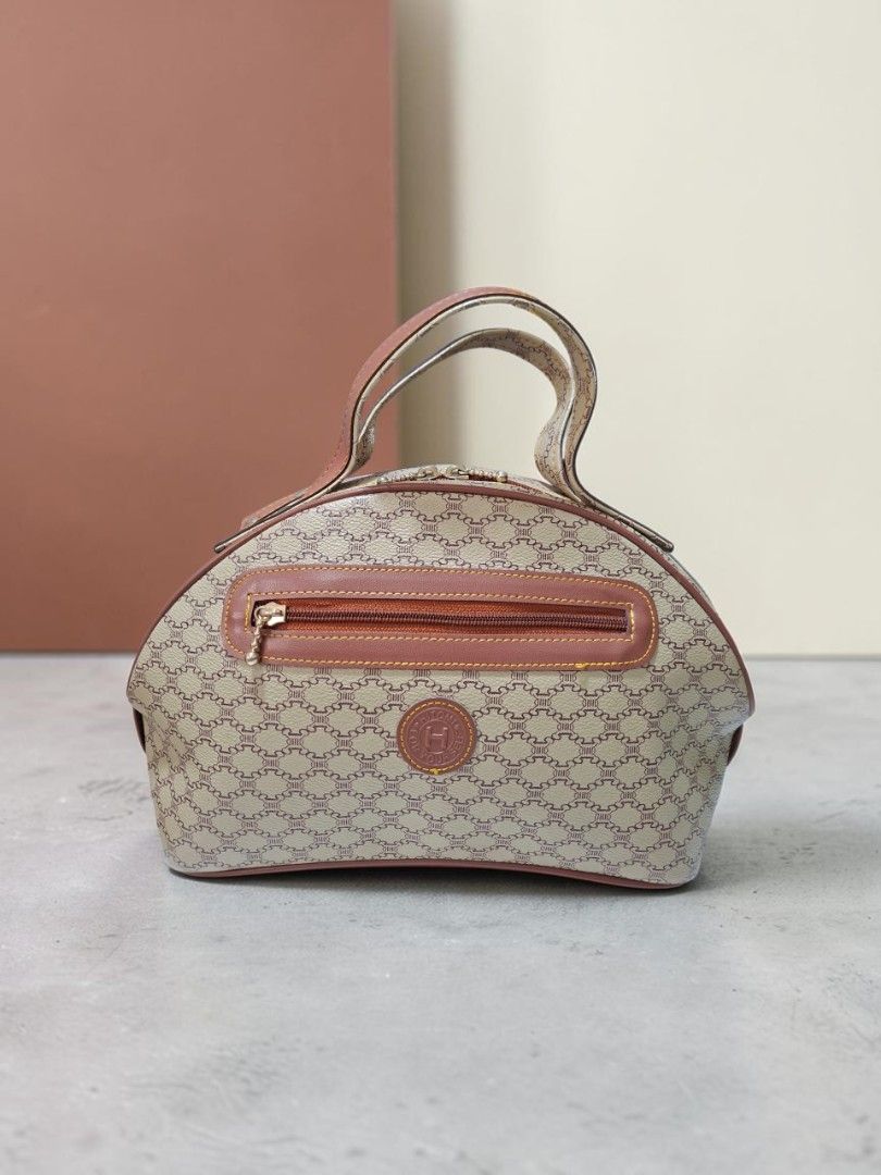 HITOMI MONOGRAM HANDBAG (Category: Tote Bags) located in Las Pinas. Submitted by annachiaonair2037 (Listing ID 1468725284, Image 1). Description: HITOMI MONOGRAM HANDBAG FROM JAPAN BEST ZIP **RIVET TARNISH H 7.5" L 14" W 4" Disclaimer: I am not affiliated with, associated with, or authorized by any of the brands featured posted. Any mention of brand names, trademarks, or logos is solely for identification and reference purposes only..