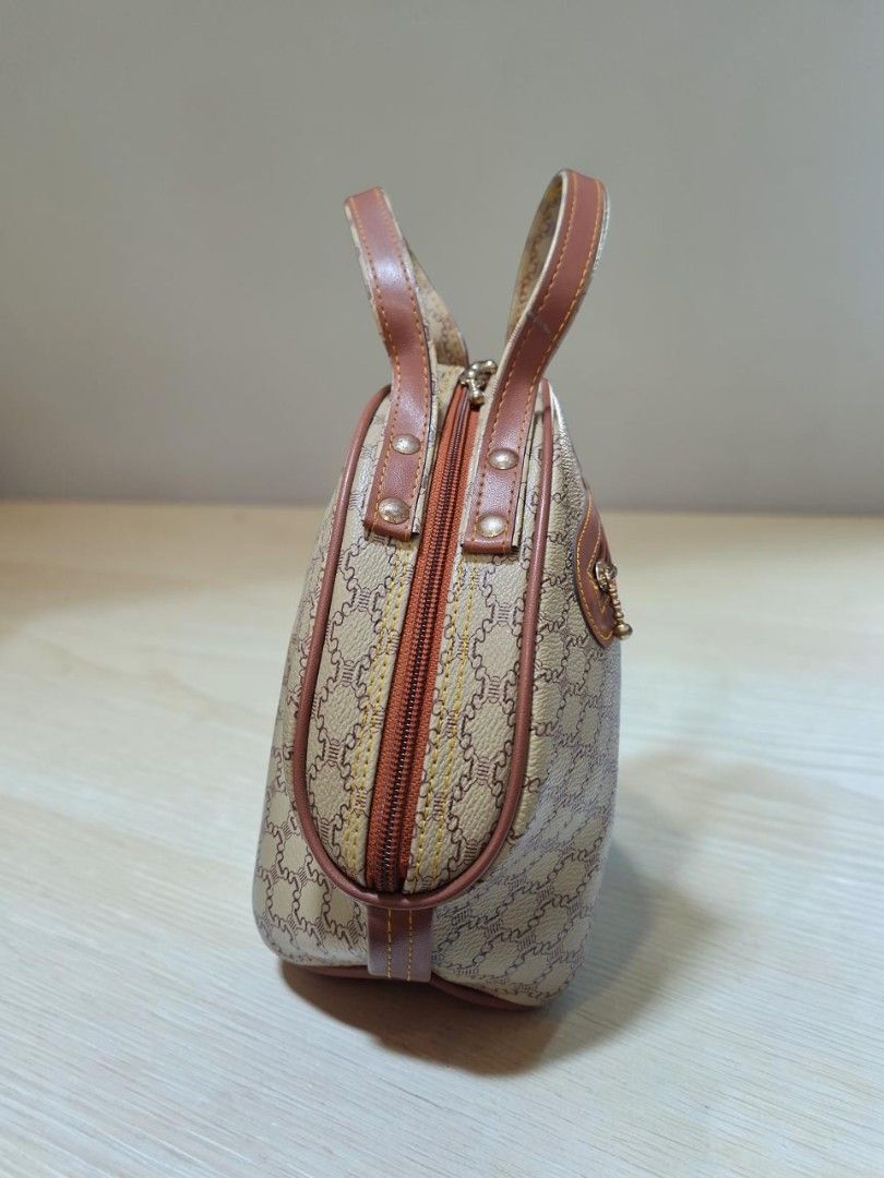HITOMI MONOGRAM HANDBAG (Category: Tote Bags) located in Las Pinas. Submitted by annachiaonair2037 (Listing ID 1468725284, Image 3). Description: HITOMI MONOGRAM HANDBAG FROM JAPAN BEST ZIP **RIVET TARNISH H 7.5" L 14" W 4" Disclaimer: I am not affiliated with, associated with, or authorized by any of the brands featured posted. Any mention of brand names, trademarks, or logos is solely for identification and reference purposes only..