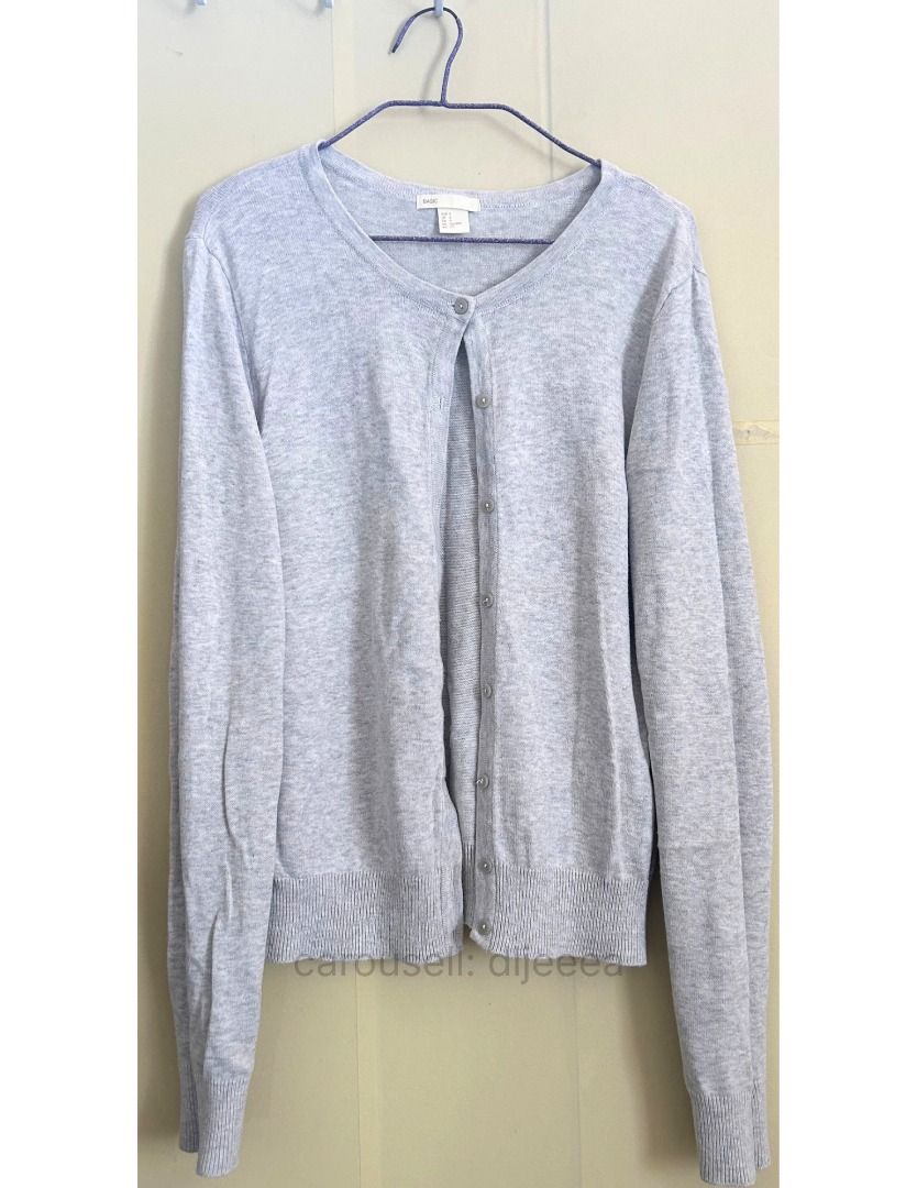 H&M Basic Grey Cardigan Size S (Category: Coats, Jackets and Outerwear) located in Ajuy. Submitted by dljeeea (Listing ID 1468726899, Image 1). Description: RFS: Doesn't fit me anymore & does not look well with my body type - Size: Small - Color: Neutral grey (goes with everything) - Material: Soft and lightweight knit - Design: Round neckline with front button closure - Details: Ribbed hem and cuffs - Condition: Excellent, easy to throw on over 
