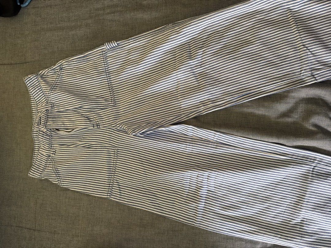 H&M Divided Blue Striped Pants (Category: Jeans) located in Manila. Submitted by jaehyun2829 (Listing ID 1468735325, Image 3). Description: - Brand: H&M Divided - Only used once - Style: Blue and white striped utility pants with straight leg fit - Size: EUR 32 / US 0 - Material: 100% cotton - Waist: High waist with zipper fly closure - Features: Front patch pockets and side hammer loop.
