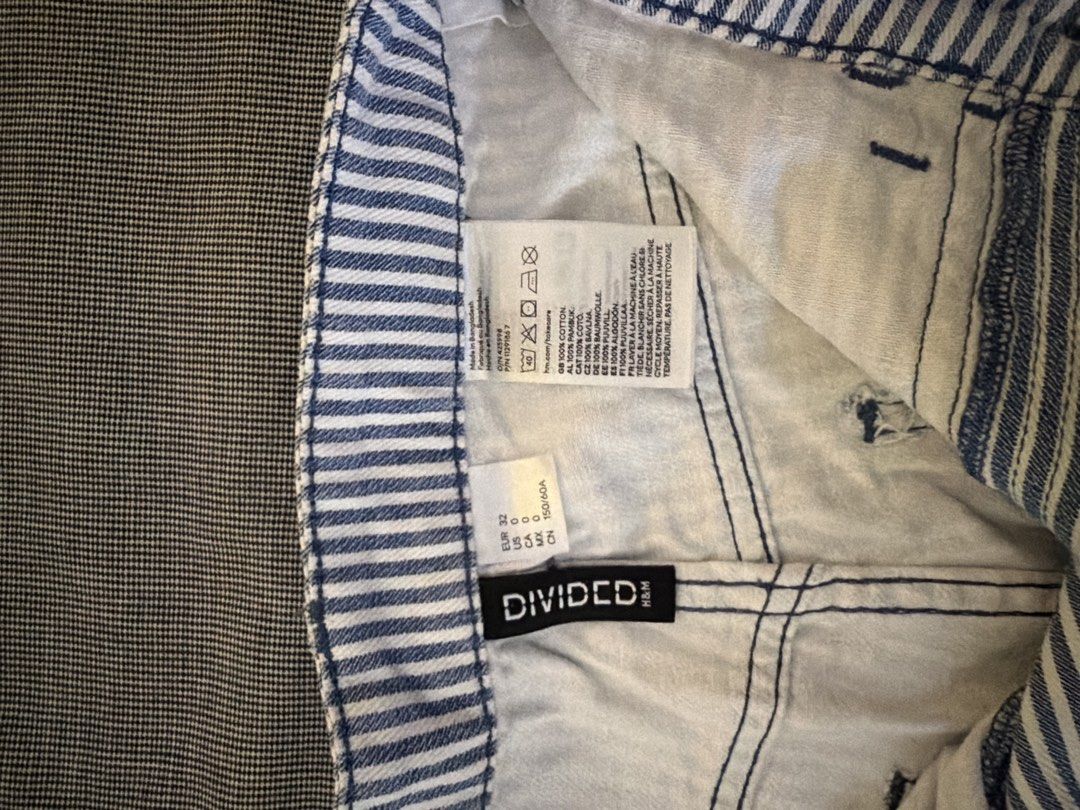 H&M Divided Blue Striped Pants (Category: Jeans) located in Manila. Submitted by jaehyun2829 (Listing ID 1468735325, Image 1). Description: - Brand: H&M Divided - Only used once - Style: Blue and white striped utility pants with straight leg fit - Size: EUR 32 / US 0 - Material: 100% cotton - Waist: High waist with zipper fly closure - Features: Front patch pockets and side hammer loop.