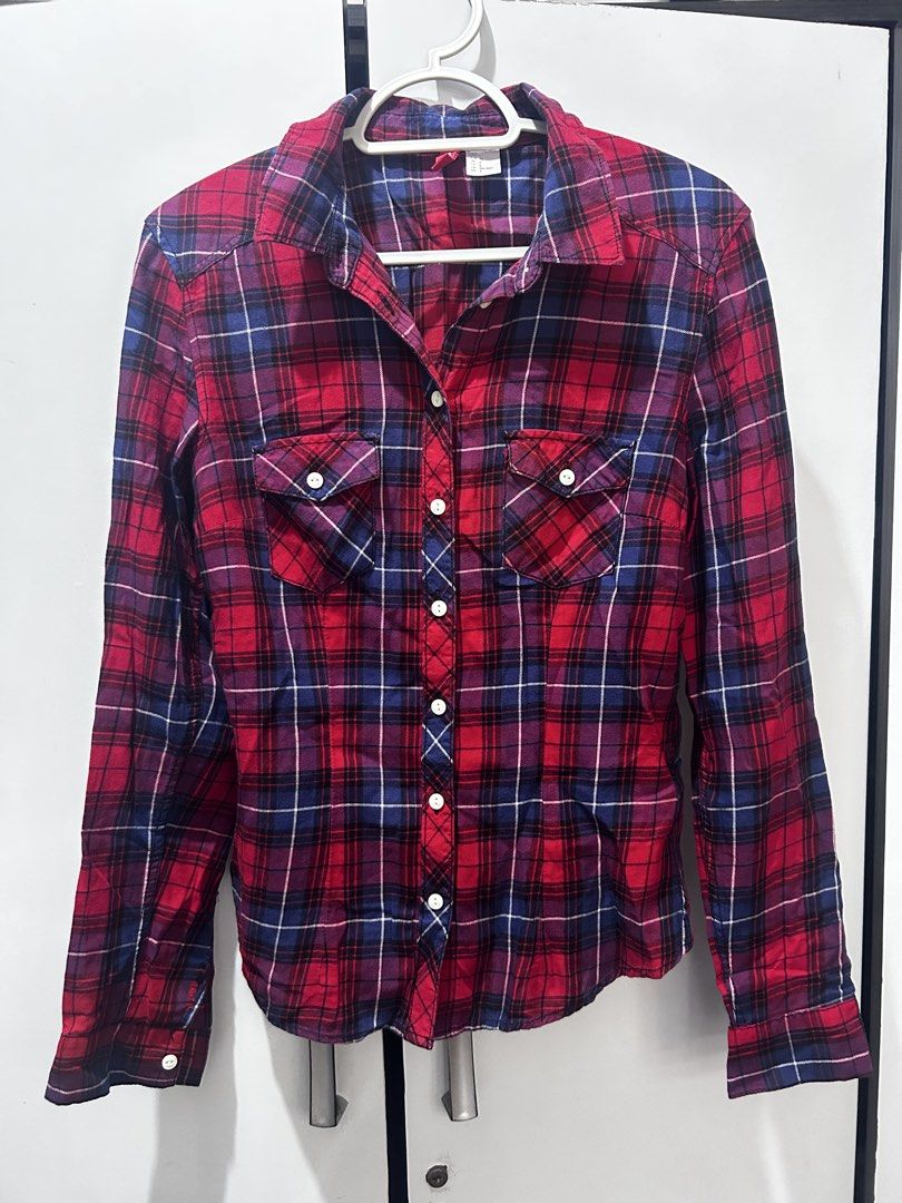 H&M Divided Red & Navy Button-Down Shirt (Category: Longsleeves) located in Pasig City. Submitted by ladyleslieisletavelarde4902 (Listing ID 1468761125, Image 1). Description: A classic grunge-chic plaid button-down woven in vibrant red and navy tones—the ultimate layering piece for effortless, casual cool. Brand: H&M Size: Tag EUR 34 / US 4 (Fits XS–S) Style: Long-Sleeve Button-Down Flannel Shirt with Chest Pockets Purchase direct from store Shi