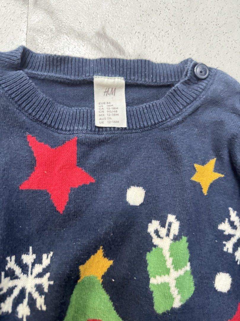 H&M Kids Christmas Sweaters Bundle Size 12-18M (Category: Babies & Kids Fashion) located in Manila. Submitted by janelica220598 (Listing ID 1468819467, Image 3). Description: - Set of 2 festive H&M holiday sweaters for toddlers - Includes a red reindeer/gift design and a blue penguin/tree design - Size: EUR 86, US 18M, 12-18 months - Soft and cozy knit fabric to keep little ones warm - Features shoulder buttons for quick and easy dressing - Ideal