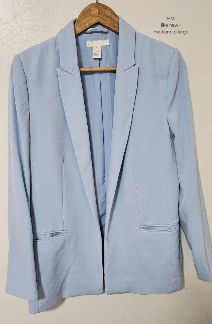 H&M Light Blue Blazer Jacket (Category: Coats, Jackets and Outerwear) located in Laoag. Submitted by __baptistakim (Listing ID 1468831875, Image 1). Description: Light blue blazer from H&M. Open front design with lapels and two front pockets. Fully lined interior. Fits medium to large sizes. Great piece for office wear or dressing up a casual outfit. Clean and ready to wear..