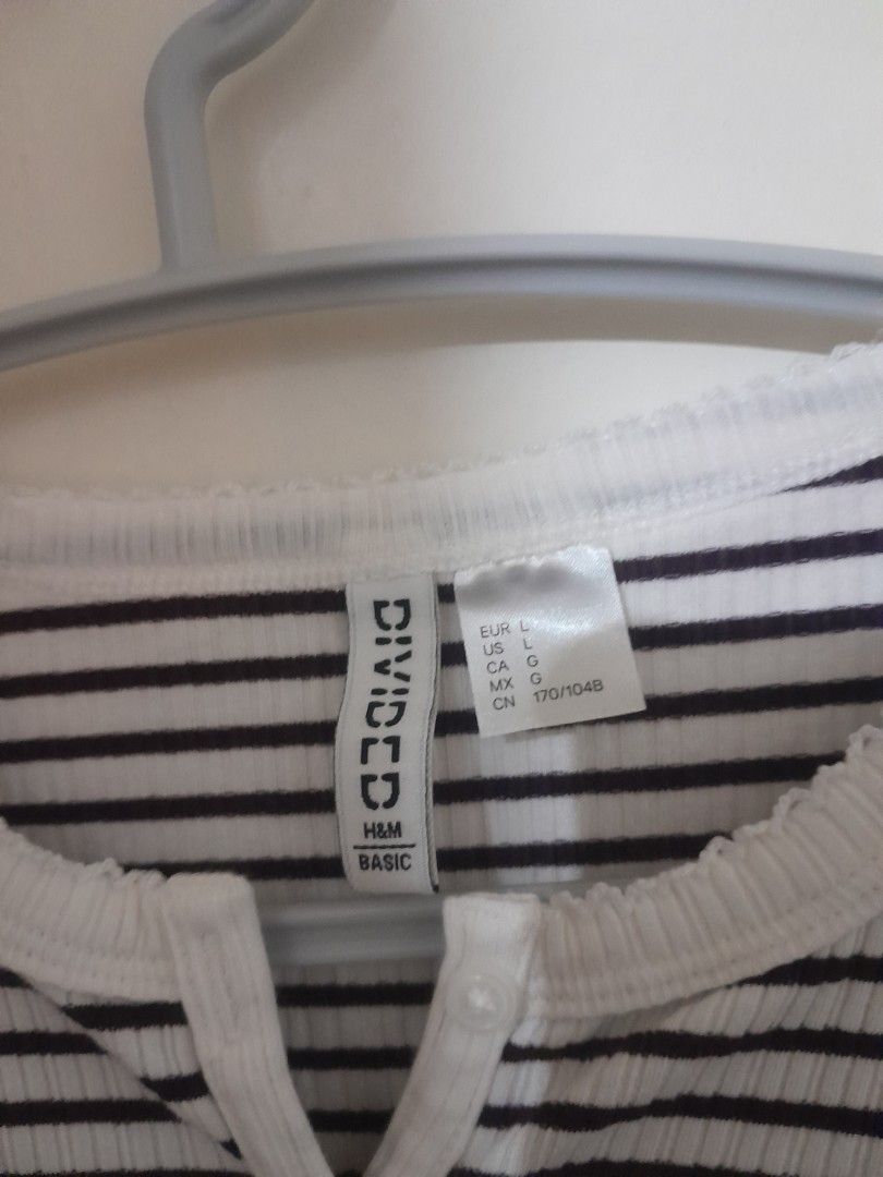H&M stripes longsleeves (Category: Longsleeves) located in Quezon City. Submitted by warmturtle.ba931b (Listing ID 1468776944, Image 2). Description: H&M Striped Long-Sleeve Blouse ✨ Authentic H&M long-sleeve blouse 🤍 White with thin black horizontal stripes 🖤 Classic, timeless design; easy to mix and match 📏 Size L 🌸 Like-new condition 🫧 Clean and freshly washed 💖 Well-kept and well-maintained 👖 Perfect to pair with jeans, trousers, skirt