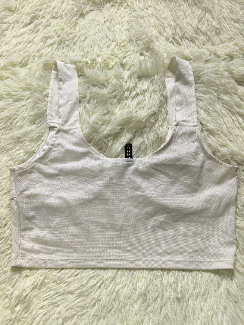 H&M White Ruched Crop Top Bundle (Category: Sleeveless) located in Tacloban City. Submitted by thead.declutters (Listing ID 1468808748, Image 3). Description: - Brand: H&M DIVIDED - Quantity: Set of 2 - Details: Square neckline, ruched bust, cute center bow, thick shoulder straps - Material: Super stretchy and comfortable fabric - Styling: Perfect to pair with high-waisted denim or skirts - Condition: Great wardrobe basics.