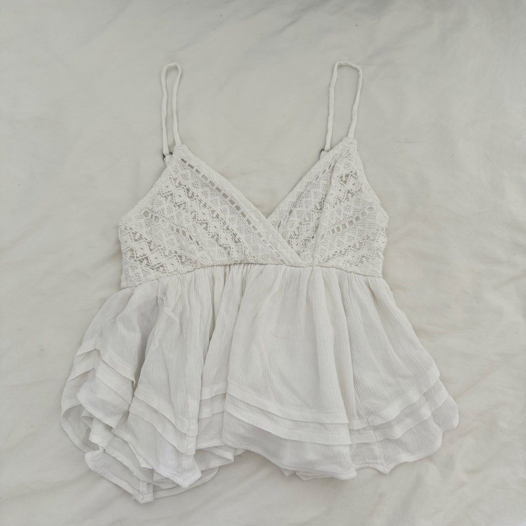 Hollister Babydoll Top (Category: Sleeveless) located in Davao. Submitted by aug_amari (Listing ID 1468730966, Image 1). Description: size M but fits size S!! w blueish stain inside but not visible when worn cus nasa inside lng swipe last photo :) cheaap na & fix .