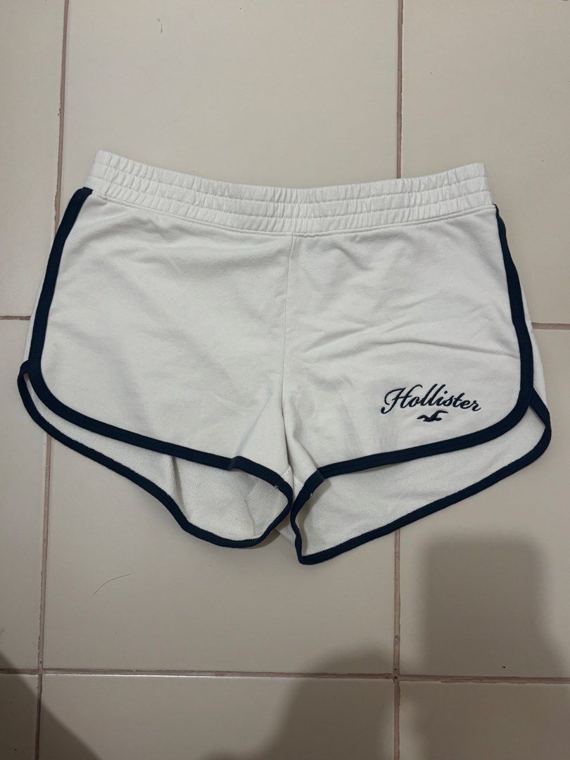 Hollister High-Rise Shorts (Category: Shorts) located in Manila. Submitted by elianner (Listing ID 1468804559, Image 1). Description: Brand: Hollister Size: Small (S) Color: White with navy blue trim RFS: DECLUTTERING .