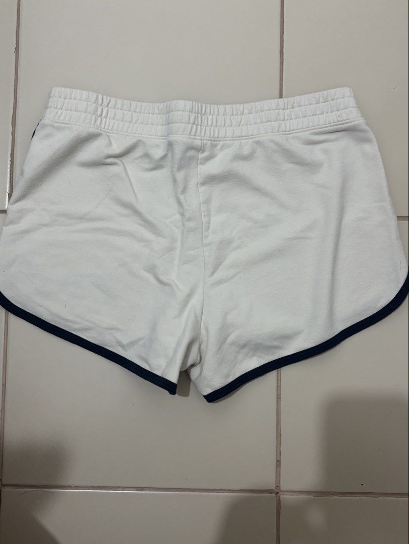 Hollister High-Rise Shorts (Category: Shorts) located in Manila. Submitted by elianner (Listing ID 1468804559, Image 3). Description: Brand: Hollister Size: Small (S) Color: White with navy blue trim RFS: DECLUTTERING .