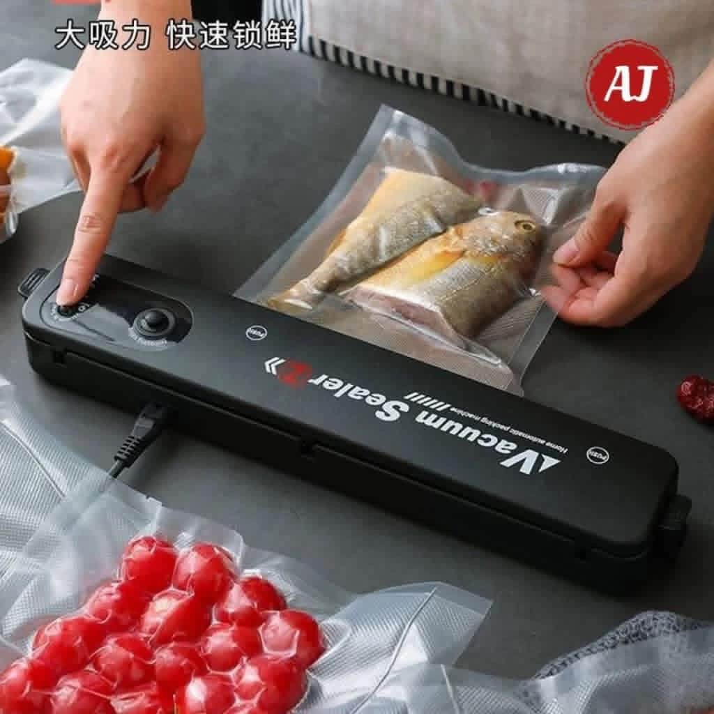 Home Automatic Vacuum Sealer Machine Food Storage Packer (Category: Food Organization & Storage) located in Manila. Submitted by iliasjen3082126 (Listing ID 1468864393, Image 1). Description: - Product: Black automatic vacuum sealer machine - Condition: Like new in original box - Features: Strong suction power and quick sealing action - Benefits: Keeps meat, dry goods, and produce fresh longer; ideal for meal prepping and sous vide - Inclusions: 
