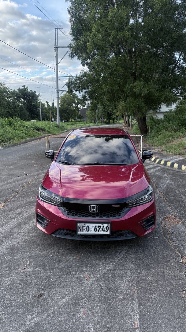 Honda City 1.5 Basic V Sedan i-VTEC (A) (Category: Used Cars) located in Caloocan City. Submitted by keenphoenix.122251 (Listing ID 1468744174, Image 2). Description: 🚗 FOR SALE! FOR SALE! FOR SALE! 2022 Honda City 1.5 RS Sedan A/T ⛽ Gasoline | Automatic Transmission 💰 PRICE: ₱750,000 ONLY! TOP-OF-THE-LINE RS VARIANT! ✅ Ignite red Metallic ✅ 43,769 KM Mileage (Original) ✅ Ending Plate Number: 9 ✅ Paddle Shifters ✅ Push-Button Engine Start ✅ Lea