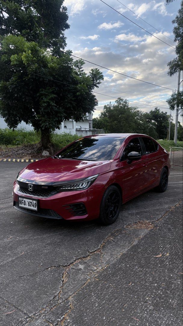 Honda City 1.5 Basic V Sedan i-VTEC (A) (Category: Used Cars) located in Caloocan City. Submitted by keenphoenix.122251 (Listing ID 1468744174, Image 1). Description: 🚗 FOR SALE! FOR SALE! FOR SALE! 2022 Honda City 1.5 RS Sedan A/T ⛽ Gasoline | Automatic Transmission 💰 PRICE: ₱750,000 ONLY! TOP-OF-THE-LINE RS VARIANT! ✅ Ignite red Metallic ✅ 43,769 KM Mileage (Original) ✅ Ending Plate Number: 9 ✅ Paddle Shifters ✅ Push-Button Engine Start ✅ Lea