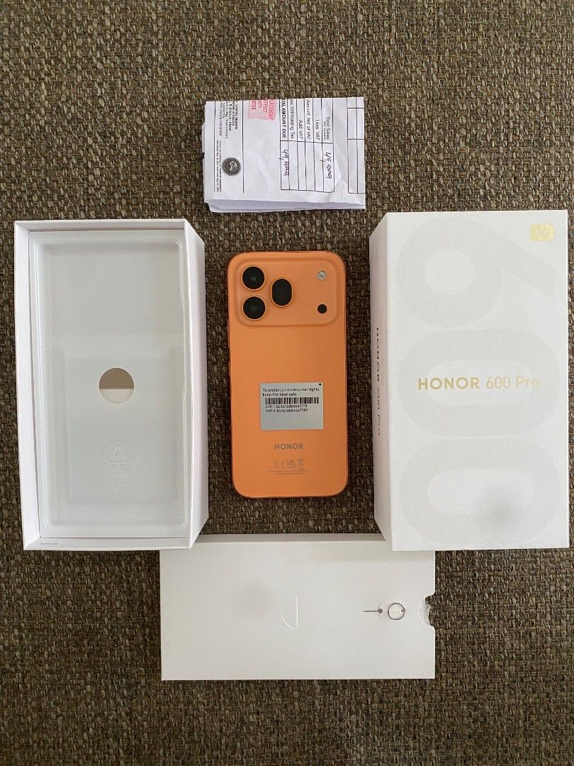 Honor 600 Pro 512GB Orange (Category: Huawei) located in Bulacan. Submitted by retapmoves007 (Listing ID 1468786757, Image 2). Description: - Model: Honor 600 Pro (Vibrant Orange) - Storage & Memory: 512GB ROM + 12GB RAM (Expandable with 16GB Honor RAM Turbo) - Processor: Snapdragon 8 Elite Mobile Platform - Battery: 7000mAh at 100% health - Condition: Immaculate, like new - Inclusions: Original box, receipt, and all packaging accessories.