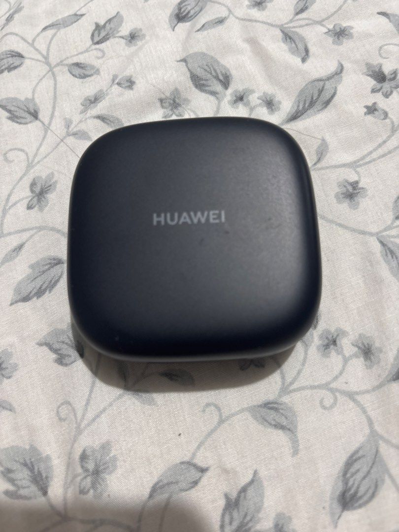 Huawei FreeArc Wireless Earbuds (Category: Earphones) located in Manila. Submitted by scaparas (Listing ID 1468846501, Image 1). Description: - Model: Huawei FreeArc Open-Ear Wireless Earbuds - Color: Sleek matte black - Design: Unique C-bridge for a secure, comfortable fit - Condition: Clean matte finish on earbuds and case, pairing light works normally - Inclusion: Charging case included (battery specs on the back).