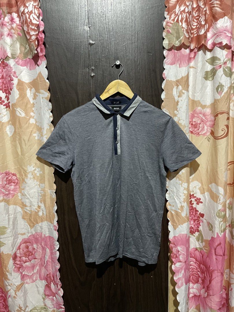 HUGO BOSS POLO SHIRT (Category: Formal Shirts) located in Cagayan de Oro. Submitted by dwight_666 (Listing ID 1468856107, Image 1). Description: small on tag 19x26 medium standard size complete tags excellent condi issue: last pic minimal collar line lang color rate; 9.5/10 .