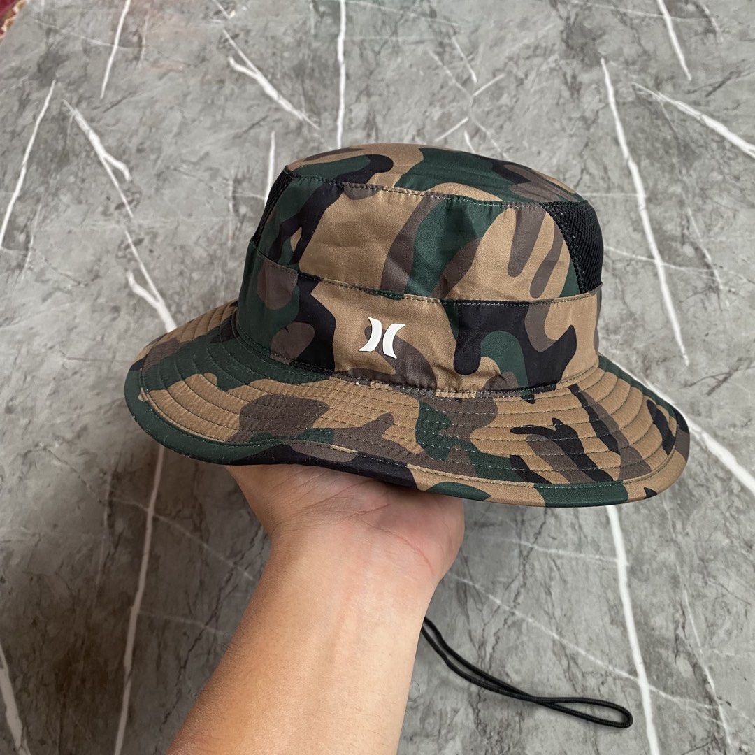 Hurley Camouflage Bucket Hat (Category: Hats & Beanies) located in Naga. Submitted by wanderingtreasures.ph1 (Listing ID 1468856215, Image 2). Description: Hurley Camouflage Bucket Hat (Not thirfted) (Brandnew without hangtag) Condition 10/10 Color rate 10/10 Authentic Stretchable Nylon material Mesh side panel Rubberized logo OSFA No issues (Brandnew) php + sf 📩 📍Naga Cebu.