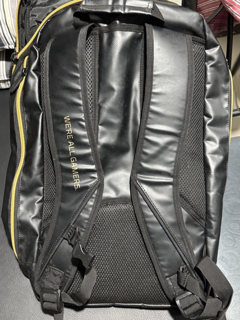 HyperX Gaming Backpack Black Gold (Category: Backpacks) located in Cavite. Submitted by marcuz1316 (Listing ID 1468827544, Image 2). Description: - Authentic HyperX gaming backpack in black with stylish gold zippers and branding - Durable, water-resistant outer material to keep your gear safe - Padded laptop compartment and convenient mesh organizer pockets - Adjustable shoulder straps with a secure chest buckle - Features the iconic 'WE'RE ALL G