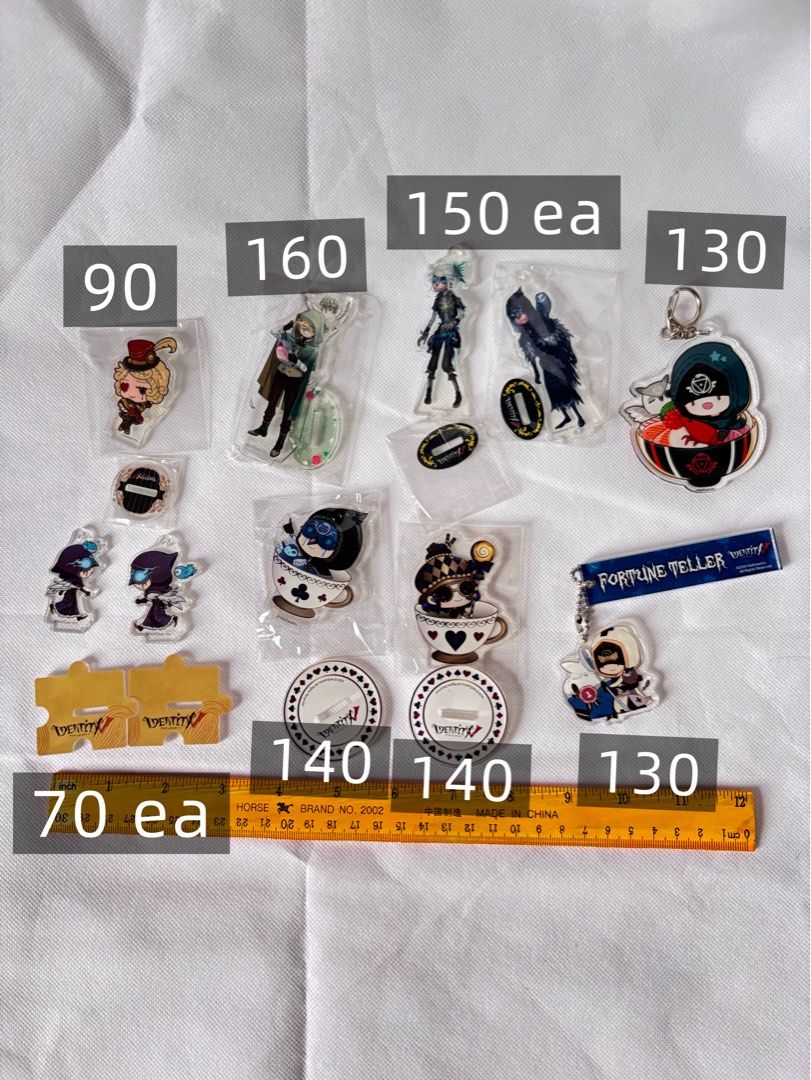 Identity V Acrylic Standee Small size Keychains IDV merch (Category: Character Goods) located in Manila. Submitted by betlogmo (Listing ID 1468753953, Image 2). Description: Prices stated on photo. No to sensitive buyers❌ These are not brand new items, I have opened them and inspected them before and kept them in their packaging for collection purposes. Sure buyers only, mine now pay now. Lowballing a single item or purchase will get you blocked.
