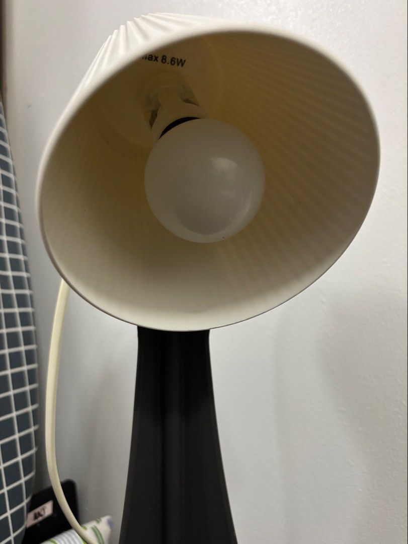IKEA Svallet Desk Lamp Grey White (Category: Lighting) located in Makati City. Submitted by angelliepurrrr (Listing ID 1468768973, Image 3). Description: - Item: IKEA Svallet Work Lamp - Color: Grey and white with textured shade - Condition: Clean and 100% working - Features: Includes power cord with inline switch and bulb - Perfect for: Desks or bedside *Bulb included. .