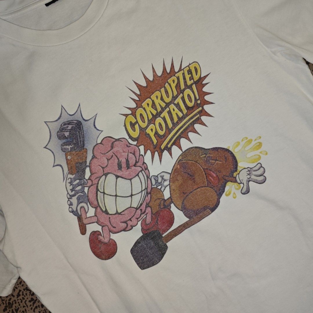 Imran Potato x Rays Corrupted Mind “Corrupted Potato” Graphic Shirt (Category: Tshirts & Polo Shirts ) located in Tanay. Submitted by polothriftedit (Listing ID 1468865936, Image 2). Description: Issue: cut tag Still in excellent condition Color rate: 10/10 No loose stitches, no distressing dimes: width: 22.5" length: 28.5" no return, no exchange, no refund [ pwede tumawad kahit walang kasalanan ].