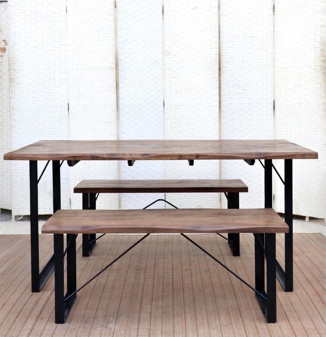 Industrial Wooden Dining Table With Two Benches (Category: Tables & Sets) located in Manila. Submitted by justinlei.103 (Listing ID 1468844701, Image 3). Description: JAPAN SURPLUS FURNITURE “Sankan Japan” HEAVY SOLID WOOD SLAB WOO DESIGN 4 SEATERS DINING SET IN METAL FRAME Size 59L x 31W x 27.75H” (TABLE) 41L x 15W x 16.5SH”(BENCH CHAIRS) (AS-IS ITEM) *Minimal Scratch Only IN GOOD CONDITION.