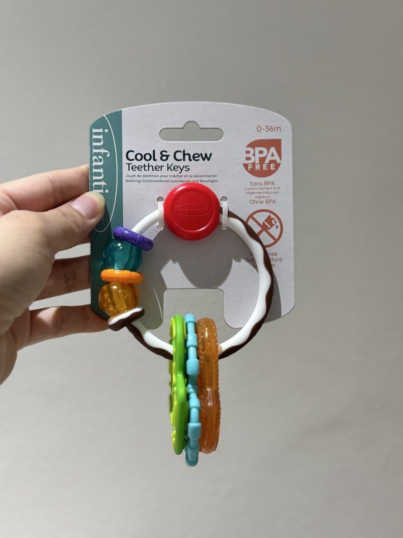 Infantino Cool & Chew Teether Keys (Category: Soothers & Pacifiers) located in Quezon City. Submitted by joyeusefille (Listing ID 1468872892, Image 1). Description: Infantino Cool & Chew Teether Keys for babies 0-36 months. BPA-free, multi-textured keys soothe sore gums and are easy for little hands to hold. Brand new in original packaging!.