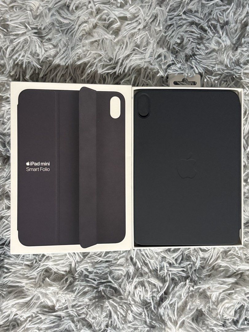 iPad mini Smart Folio Case (Charcoal Gray) - Authentic (Slightly Used) (Category: Cases & Sleeves) located in Manila. Submitted by engr.lee (Listing ID 1468863312, Image 3). Description: Selling a genuine Apple Smart Folio case for the iPad mini. Bought directly from Singapore for $89. It provides slim, lightweight protection for the front and back of your device. It automatically wakes your iPad when opened and puts it to sleep when closed. It e