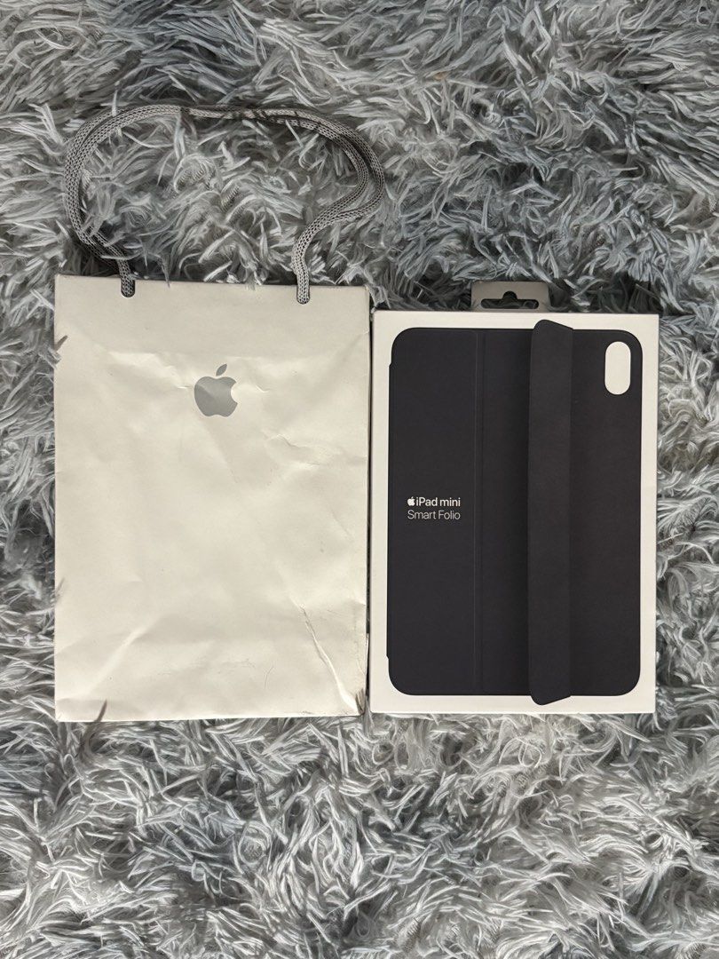 iPad mini Smart Folio Case (Charcoal Gray) - Authentic (Slightly Used) (Category: Cases & Sleeves) located in Manila. Submitted by engr.lee (Listing ID 1468863312, Image 1). Description: Selling a genuine Apple Smart Folio case for the iPad mini. Bought directly from Singapore for $89. It provides slim, lightweight protection for the front and back of your device. It automatically wakes your iPad when opened and puts it to sleep when closed. It e