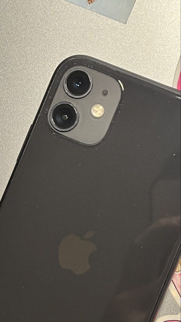 iPhone 11 128GB (Category: iPhone 11 Series) located in Angeles City. Submitted by juchi.studios (Listing ID 1468802934, Image 3). Description: Selling my iPhone 11 128GB in good working condition. Details: * 128GB storage * Local variant * No SIM restrictions (Openline) * No history of repair * True Tone working * Face ID working * Minor scratches from normal use * Battery health: 69% * Original battery, never replaced * Battery still lasts for 
