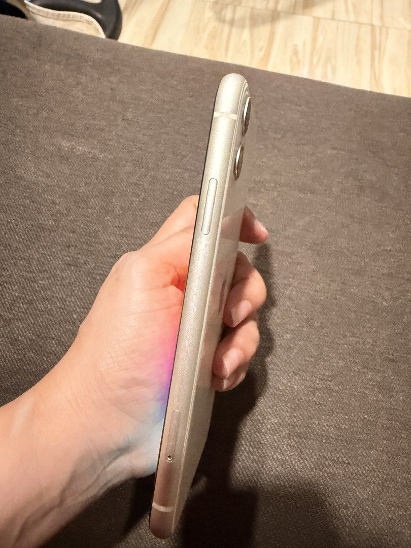 Iphone 11 128gb White (Category: iPhone 11 Series) located in Caloocan City. Submitted by declutter.sr (Listing ID 1468856352, Image 3). Description: - Brand/Model: Apple iPhone 11 - Storage Capacity: 128GB - Color: White - Condition: Pre-loved, well-maintained, with minimal scratches (see actual photos) -All settings and buttons are properly working. No any other issues just the battery health 67% - Display: Clean screen with vibrant colors - Bo