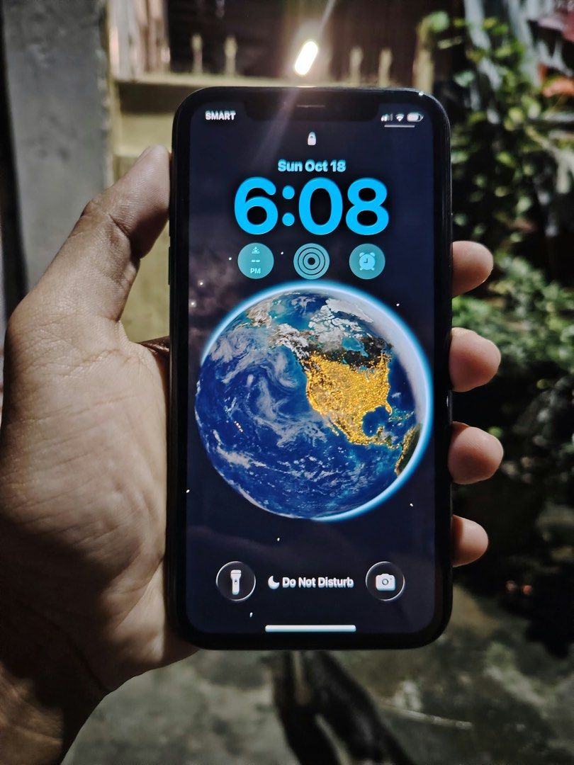 iPhone 11 (Category: iPhone 11 Series) located in Manila. Submitted by ecallierju53820 (Listing ID 1468837832, Image 1). Description: iPhone 11 64GB Smart/TNT sim only 80% Battery Health Face ID Working All parts original Negotiable Slight.