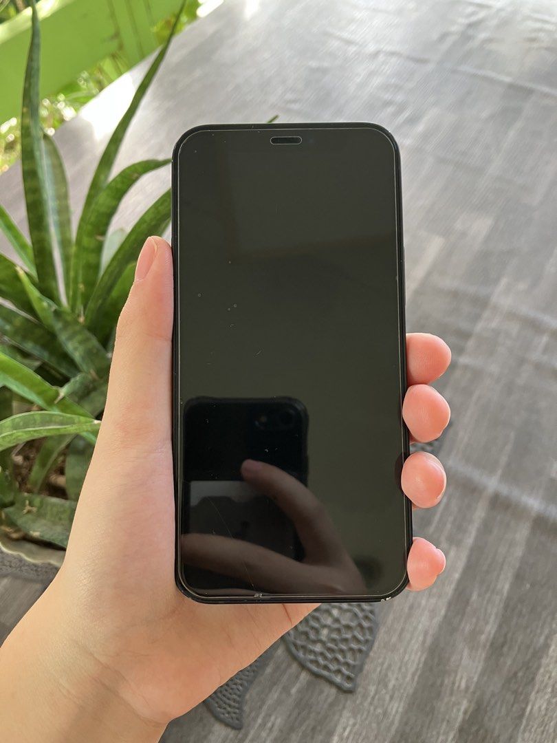 IPHONE 12 Mini (Category: iPhone 12 Series) located in San Fernando. Submitted by cassielicious (Listing ID 1468761543, Image 2). Description: Color: Black Battery Health: 72% Storage: 64GB Screen: No cracks or broken glass Body: Minor scratches around the edges Performance: Smooth and working properly Camera: [Tested and working] Face ID: [Working] Speakers & Microphone: [Working] iCloud: Ready for new owner Issues: Battery health is at 72% RFS:
