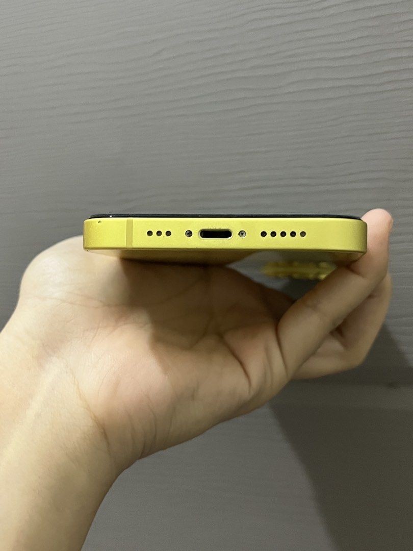 Iphone 14 128gb (Category: iPhone 14 Series) located in Gapan. Submitted by miroarch (Listing ID 1468834875, Image 3). Description: 📌 UNIT DETAILS • Model: iPhone 14 • Storage: 128GB • Color: Yellow • Battery Health: 75% • Display: Replaced OLED screen • Face ID: Working • True Tone: Working • Inclusions: Original box and charging cable ✨ CONDITION & HONEST DISCLOSURE • Screen has a very subtle pinkish tint, noticeable mainly on a pure white bac