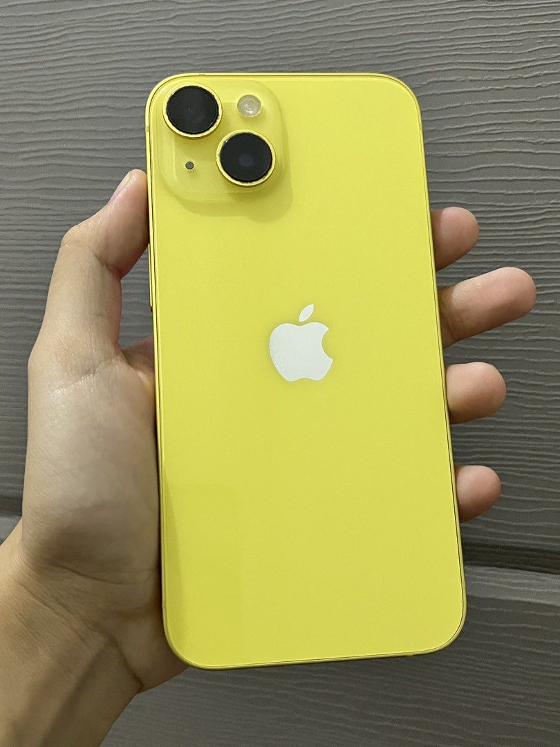Iphone 14 128gb (Category: iPhone 14 Series) located in Gapan. Submitted by miroarch (Listing ID 1468834875, Image 2). Description: 📌 UNIT DETAILS • Model: iPhone 14 • Storage: 128GB • Color: Yellow • Battery Health: 75% • Display: Replaced OLED screen • Face ID: Working • True Tone: Working • Inclusions: Original box and charging cable ✨ CONDITION & HONEST DISCLOSURE • Screen has a very subtle pinkish tint, noticeable mainly on a pure white bac