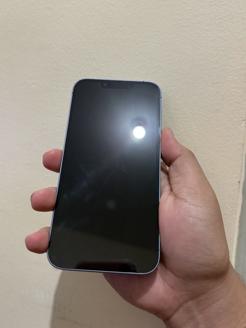 iPhone 14 - FU 128GB Blue (Negotiable) (Category: iPhone 14 Series) located in Cainta. Submitted by duofri (Listing ID 1468884721, Image 2). Description: For sale iPhone 14 128gb Blue Factory Unlocked 73% Battery Health Physical Sim E-Sim ZP/A Variant True Tone Face ID No hidden Issue No replaced Parts Has a dent: see photo Inclusions: Unit, 2 replacement cable, 16 pieces of case only Unli Test and Reset upon meet up Negotiable for sure buyer Cai