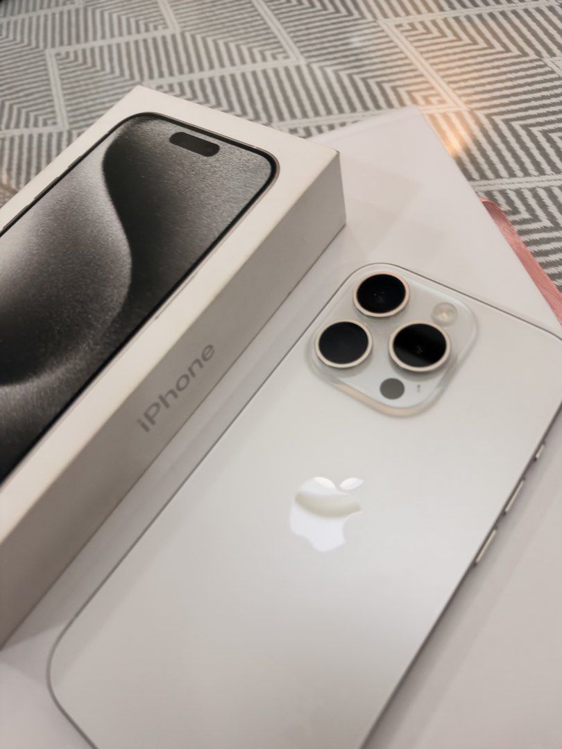 Iphone 15 pro 256gb (Category: iPhone 15 Series) located in Manila. Submitted by happylvoe (Listing ID 1468894454, Image 1). Description: Iphone 15 pro , white titanium , 256gb Inclusions: original box but no cable already . 1 original used spigen case, 1 original hoco case Open line, 81% batt health Faint hairline near front camera but barely noticeable and does not affect front camera. (Test all you want) .