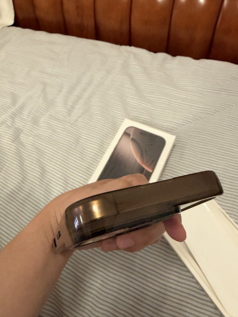 iPhone 16 Pro (Category: iPhone 16 Series) located in Antipolo. Submitted by nat0728 (Listing ID 1468733165, Image 3). Description: - Brand/Model: Apple iPhone 16 Pro - Color: Desert Titanium - Storage Capacity: 128GB, Dual Sim - Condition: Excellent / No issues (comes with protective case, tempered glass for the screen and camera) - Inclusions: Original box included - Meetup Location: Xentro Mall, Antipolo City, Rizal.