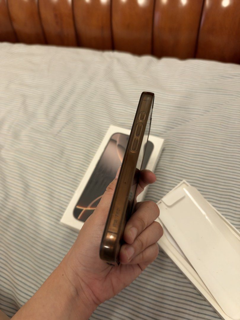 iPhone 16 Pro (Category: iPhone 16 Series) located in Antipolo. Submitted by nat0728 (Listing ID 1468733165, Image 2). Description: - Brand/Model: Apple iPhone 16 Pro - Color: Desert Titanium - Storage Capacity: 128GB, Dual Sim - Condition: Excellent / No issues (comes with protective case, tempered glass for the screen and camera) - Inclusions: Original box included - Meetup Location: Xentro Mall, Antipolo City, Rizal.