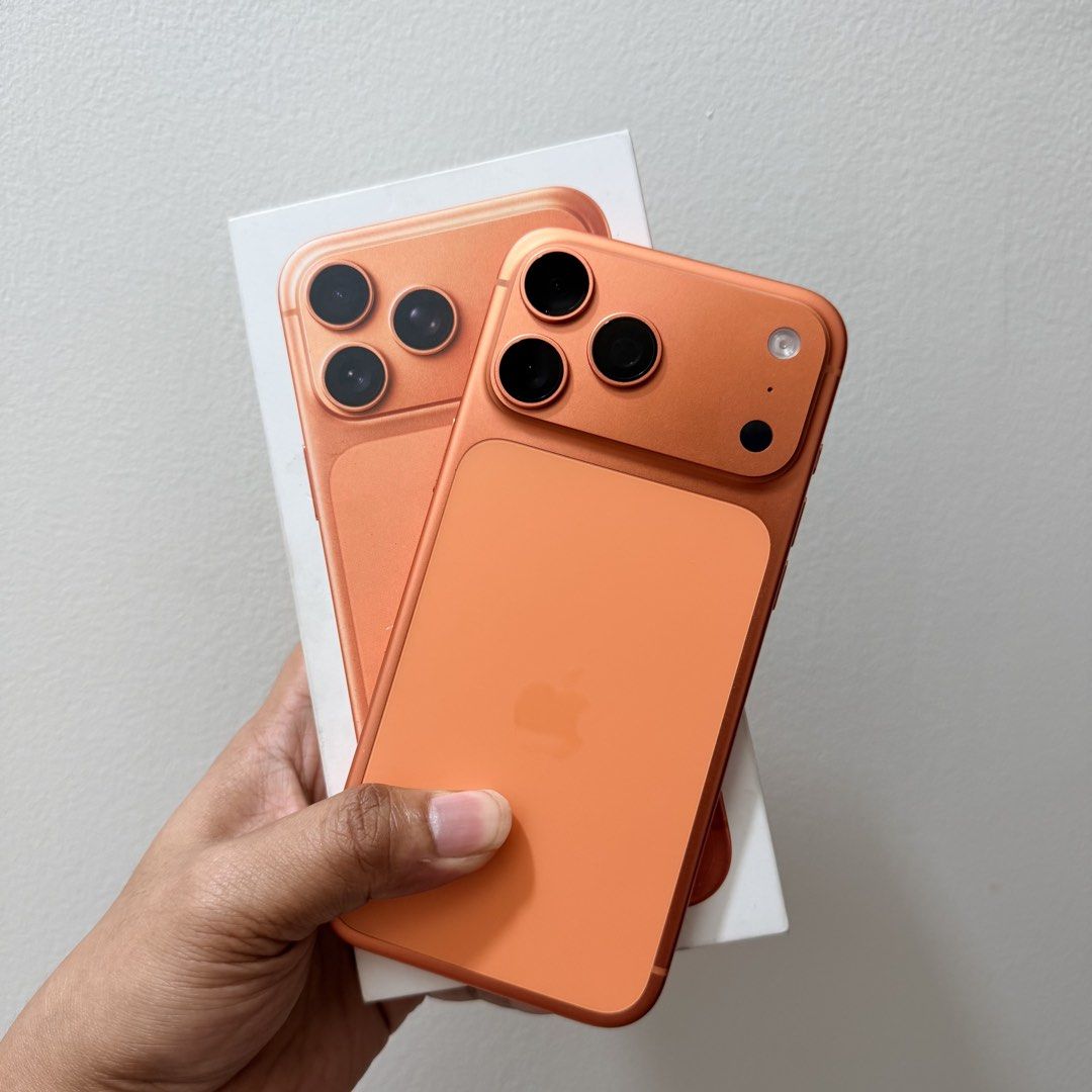 iPhone 17 Pro Max 256GB - Cosmic Orange (Category: iPhone 17 Series) located in Bacoor. Submitted by jethrocaorong (Listing ID 1468757041, Image 1). Description: * 256GB Storage * Cosmic Orange * 93% Battery Health * 543 Cycle Count * Battery Condition: Normal * Physical SIM + eSIM variant * No iCloud lock * All functions working * Minimal sign of usage - see actual photos * Complete with original box and receipt Inclusions: * iPhone 17 Pro Max *