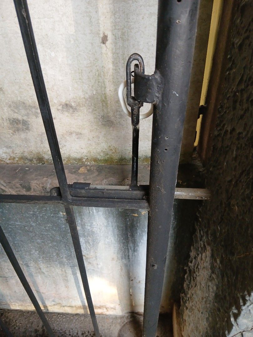Iron grills and door (Category: Bed Frames & Mattresses) located in Dasmarinas. Submitted by tataysgarage (Listing ID 1468849522, Image 3). Description: 1. Iron grills 4ft ht x 10ft length, 6 in distance per bar.. 2. Iron Door 8ftx 2.5ft, comole hinges used as double security door, grills in pharmacy business, no rust.