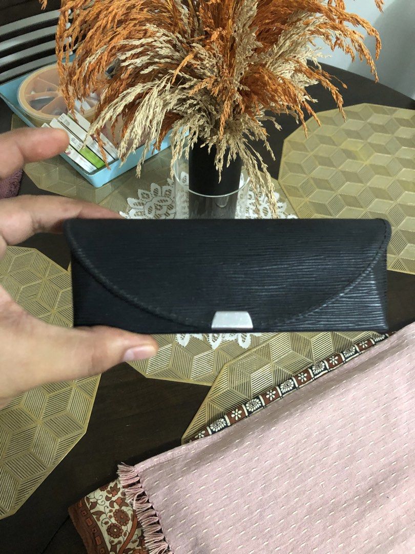 Isseido black hardshell eyeglass case (Category: Sunglasses & Eyewear) located in Lucena. Submitted by kweenritz (Listing ID 1468774396, Image 2). Description: Hi!!! Selling this hardshell eyeglass case from a famous Japanese brand “Isseido”. Complete with wipe cloth. Authentic. Very nice condition. 150 only plus shipping fee.