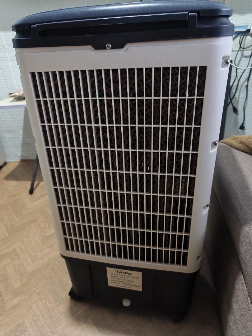 Iwata Jet S-10 Evaporative Air Cooler (Category: Air Conditioning and Heating) located in Cavite. Submitted by agatepjhesielyn (Listing ID 1468796766, Image 3). Description: - Brand/Model: Iwata Jet S-10 Evaporative Air Cooler - Cooling Performance: Honeycomb cooling pad at the back with 3 fan speeds and swing function - Ilan beses lang ito nagamit since nagpa aircon din agad. May bawas pa sa sure buyer. .