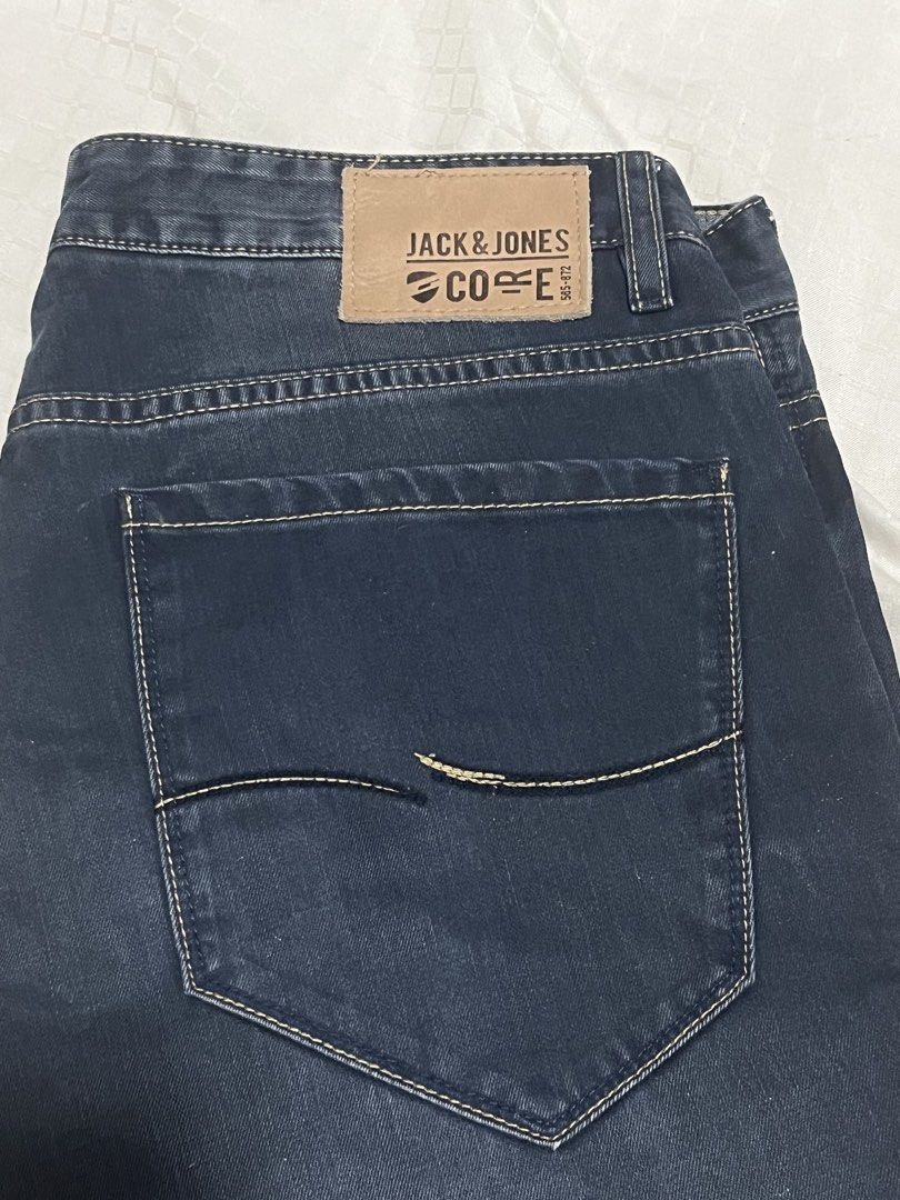 Jack & Jones Core Dark Blue Jeans (Category: Jeans) located in Manila. Submitted by chococoffeeboy (Listing ID 1468848212, Image 1). Description: Jack & Jones Core - Dark blue wash - Closure: Button fly with branded buttons - Details: Distressed accents on front pockets and legs - Branding: Leather logo patch on back waistband - Style: Classic five-pocket design with contrast stitching Waist: 33” Length: 41.5” Hem: 8” Wash before use Payment: Gca