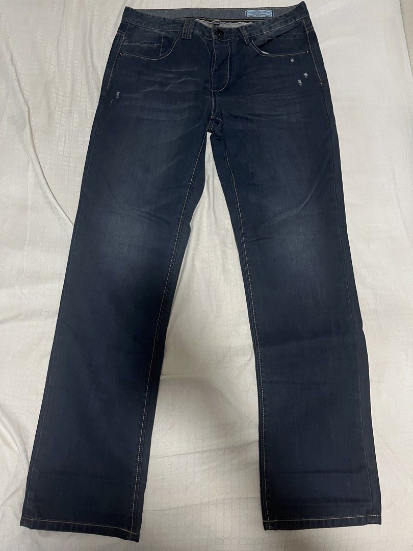 Jack & Jones Core Dark Blue Jeans (Category: Jeans) located in Manila. Submitted by chococoffeeboy (Listing ID 1468848212, Image 2). Description: Jack & Jones Core - Dark blue wash - Closure: Button fly with branded buttons - Details: Distressed accents on front pockets and legs - Branding: Leather logo patch on back waistband - Style: Classic five-pocket design with contrast stitching Waist: 33” Length: 41.5” Hem: 8” Wash before use Payment: Gca