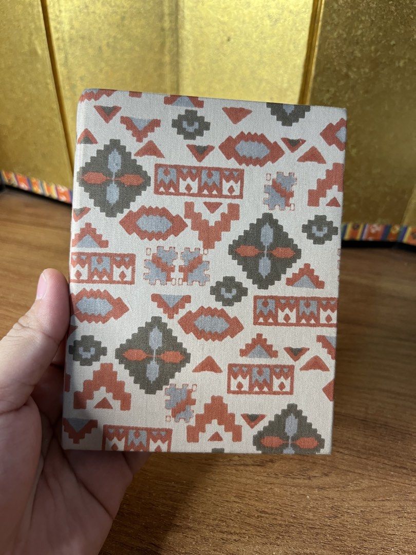 Japan 2 Picture Frame Display (Category: Other Photography Accessories) located in Gapan. Submitted by lunashop14 (Listing ID 1468717112, Image 1). Description: - Product: Japan 2-Picture Frame Display - Design: Hardcover book style with traditional geometric fabric pattern in red, grey, and black - Capacity: Holds two photos side-by-side - Condition: Very good (Layered condition 4) - Shipping: Available via J&T Express from Gapan City.