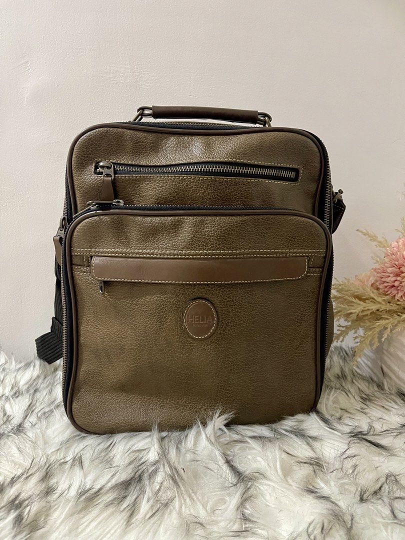Helia Leather Sling for Men (Category: Sling Bags) located in Teresa. Submitted by savvyonbranded (Listing ID 1468844712, Image 1). Description: 12 x 11 x 4 inches.