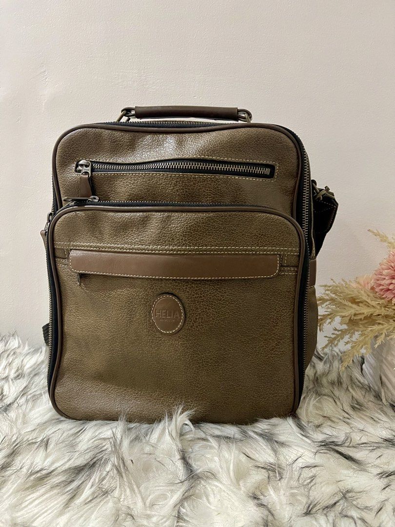 Helia Leather Sling for Men (Category: Sling Bags) located in Teresa. Submitted by savvyonbranded (Listing ID 1468844712, Image 3). Description: 12 x 11 x 4 inches.