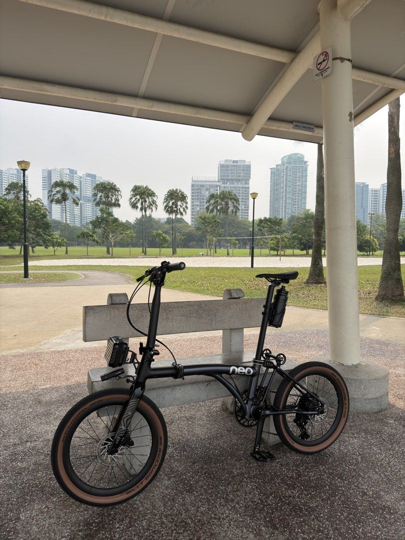 Java Neo 3 (Category: Bicycles) located in Singapore. Submitted by uchiha_monster (Listing ID 1468748190, Image 2). Description: - Model: Black Neo folding bike with carbon fork - Tires: Schwalbe Billy Bonkers - Accessories: Black water bottle holder on seat post and a small front pouch - Storage: Compact fold, easy to store and carry.